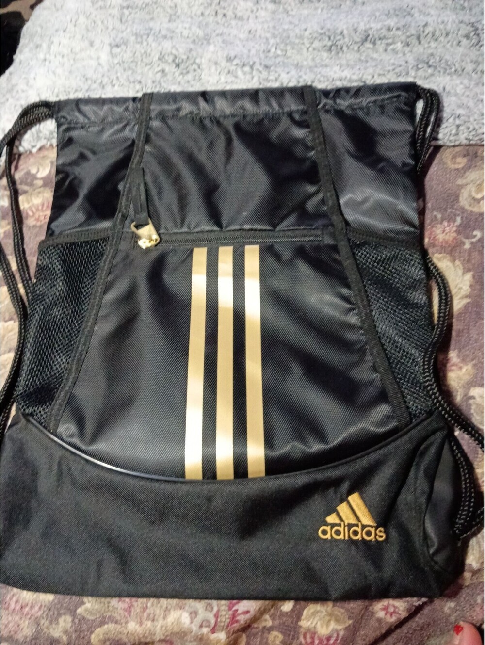 Adidas Black and Gold Drawstring Backpack with Front Zipper Pocket
